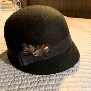 Vintage round wool black hat with feather accent
